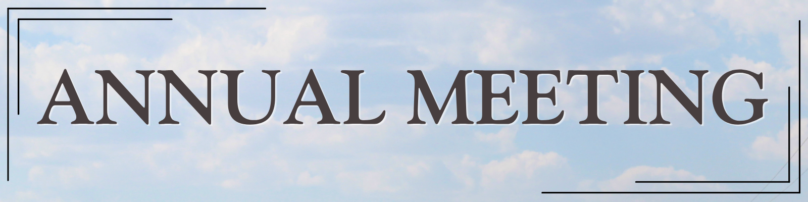Annual Meeting section header featuring the words ‘Annual Meeting’ in large dark lettering over a blue sky with scattered clouds, framed by decorative black corner accents.