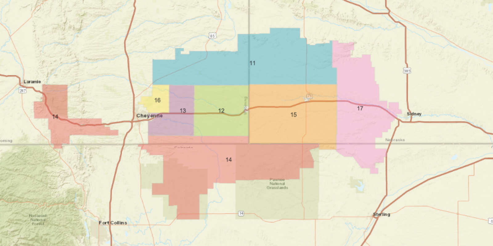 Map of High West Energy’s service territory showing color-coded director districts across southeastern Wyoming, northeastern Colorado, and western Nebraska, with district numbers and nearby communities including Cheyenne, Laramie, Sidney, and Sterling.