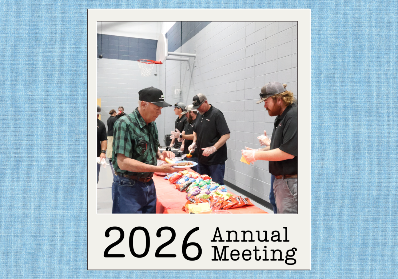 High West Energy employees serving food and visiting with members during the meal at the 2026 Annual Meeting.